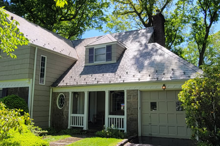 Clean or replace a manhasset roof cleaning guide for streaks moss and aging shingles