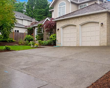 Driveway washing in manhasset what pros do differently with oil and rust stains
